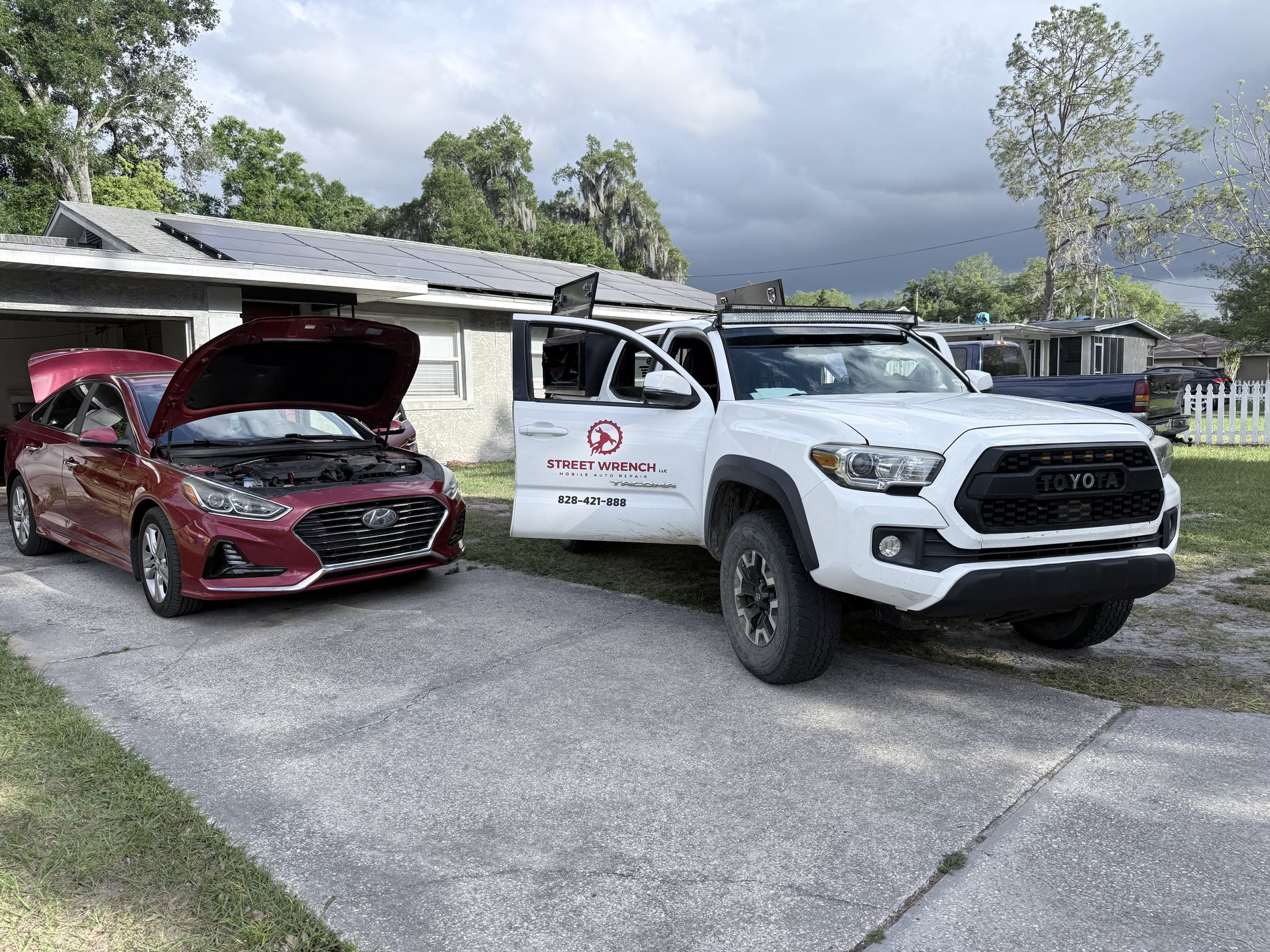 Street Wrench mobile repair truck beside a customer vehicle